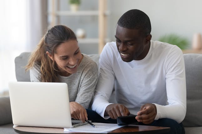 Image of a couple discussing their finances and trying out this plan: feel better about your money