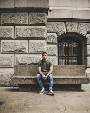 An image of a guy sitting alone, when you don't know what to say, the prayer you need is just a talk with God.