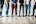 Image of people’s legs showing how I left my comfort zone and how I found my people and became a better person.