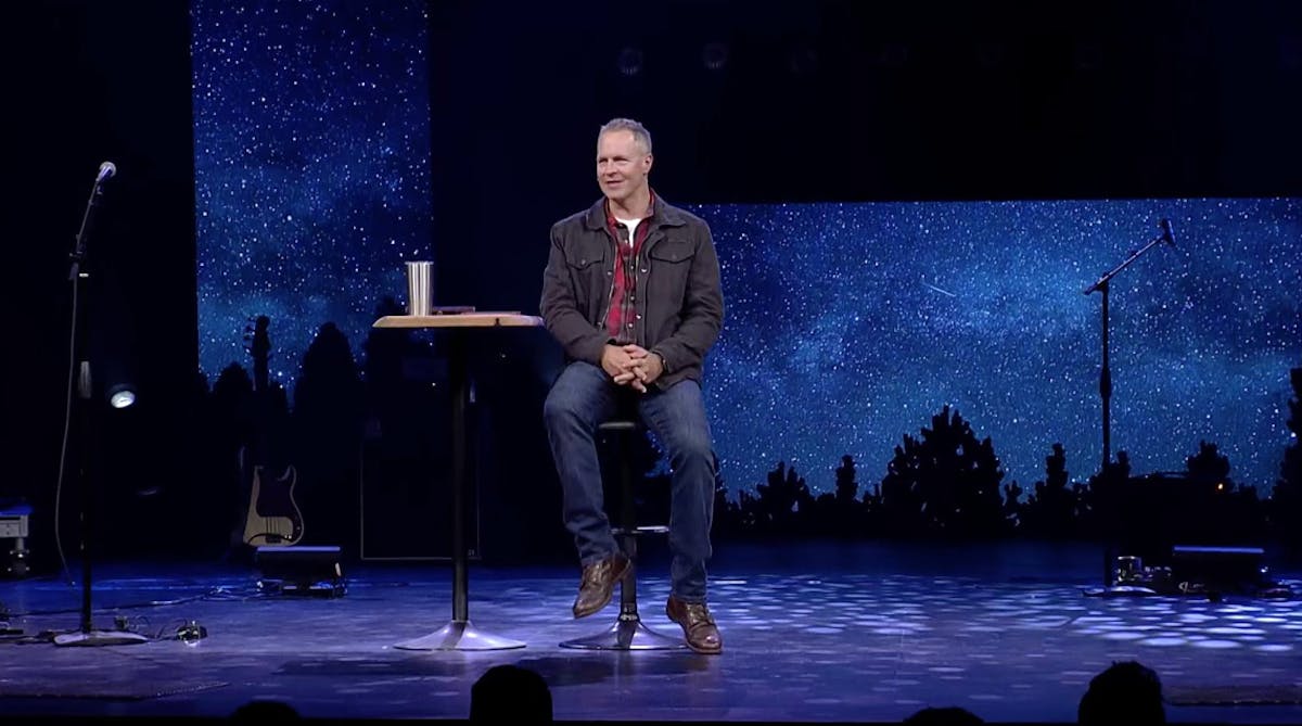 Senior Pastor Brian Tome delivers a weekly message on stage