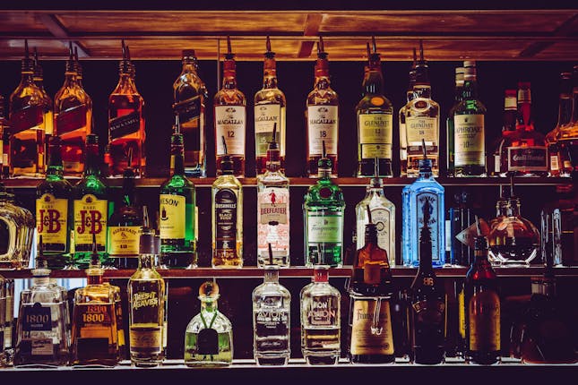 An image of a bar showing that I wondered “Am I an Alcoholic?” and questioned if there is freedom when I quit drinking. 