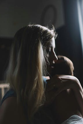 Mom holding a child